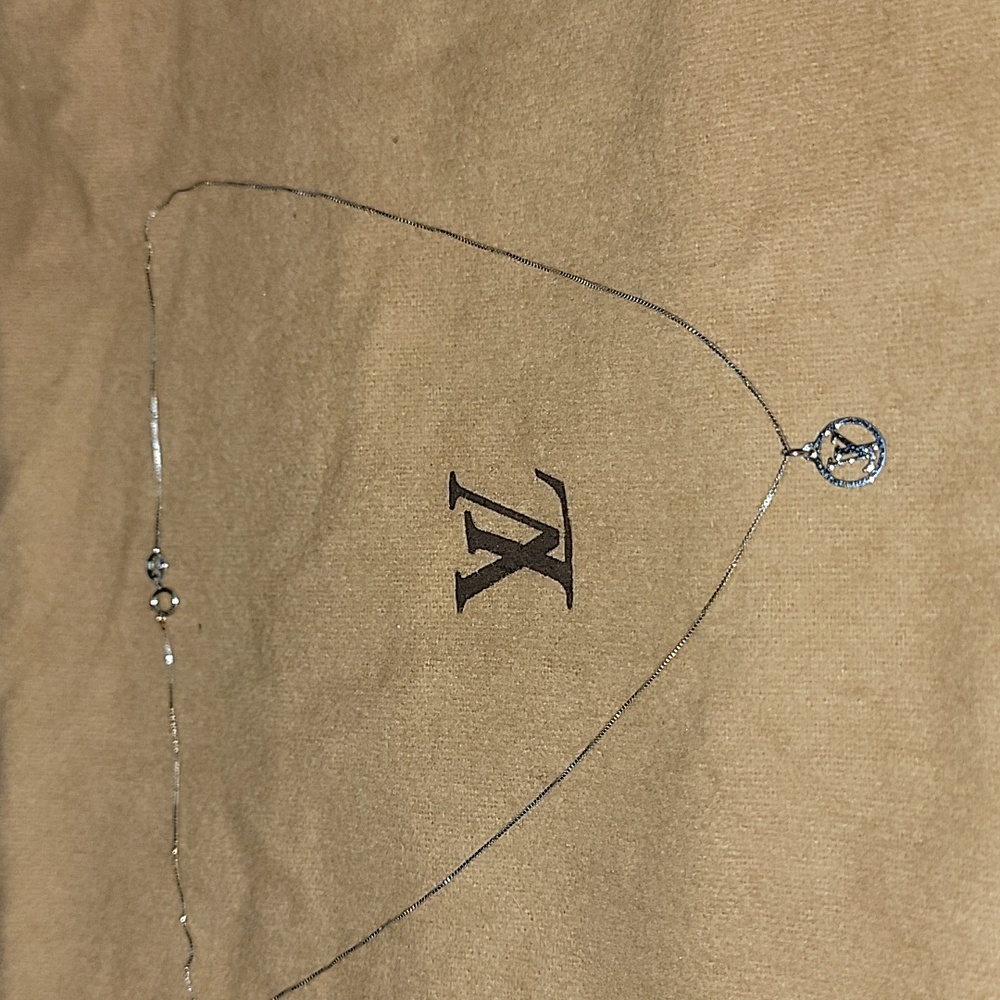Repurposed LV charms in silver with necklace